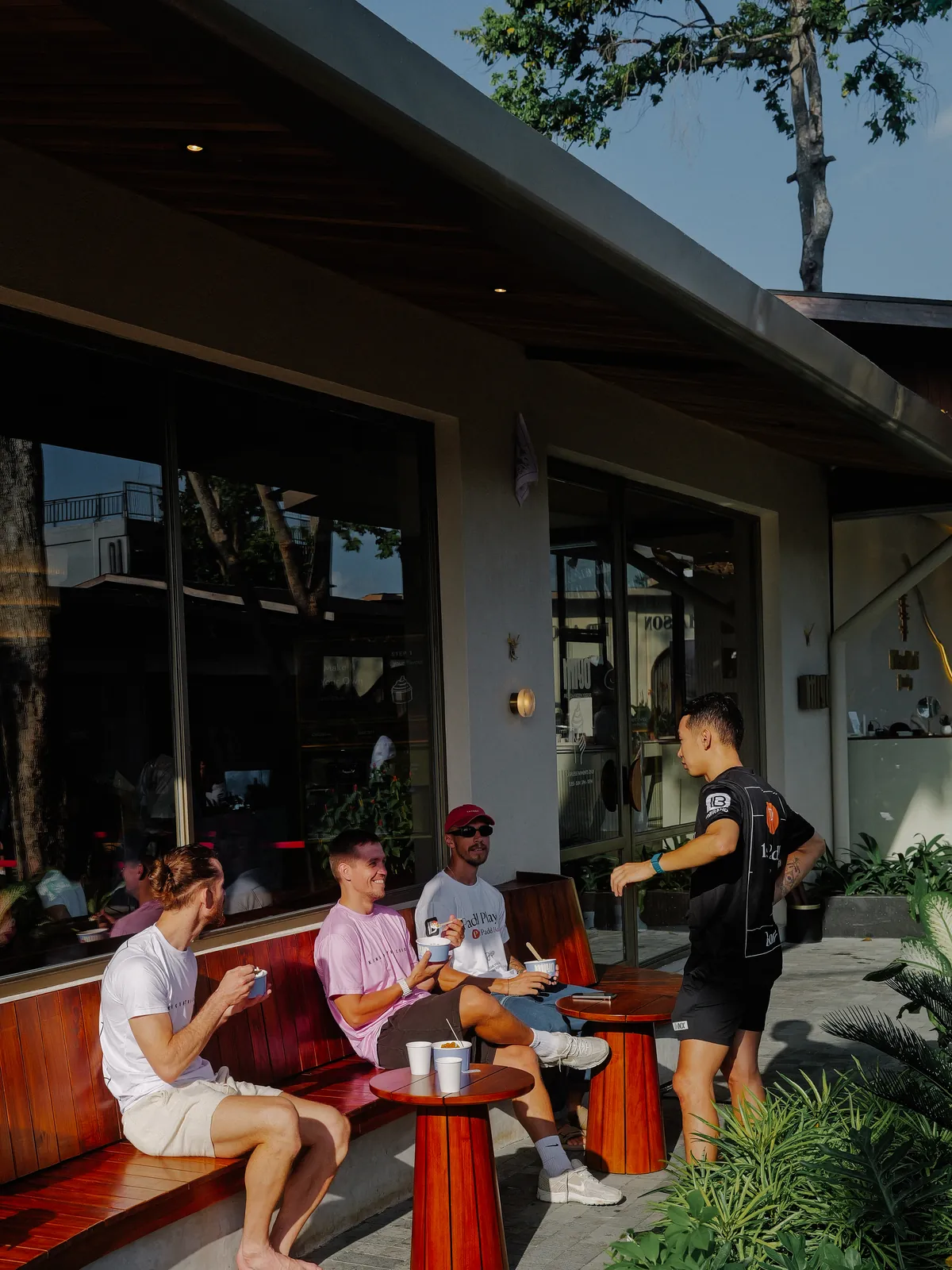 Players talking together outside the club